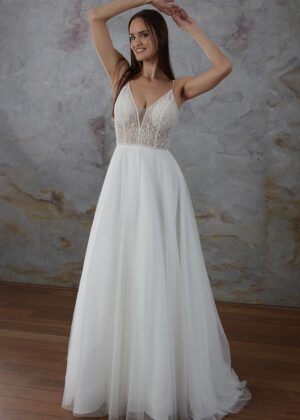 Robe de mariée élégante avec corsage en dentelle perlée et jupe fluide
