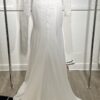 Robe de mariée Tina d’Angeola en tulle illusion avec broderies florales, décolleté en dentelle et ceinture géométrique.