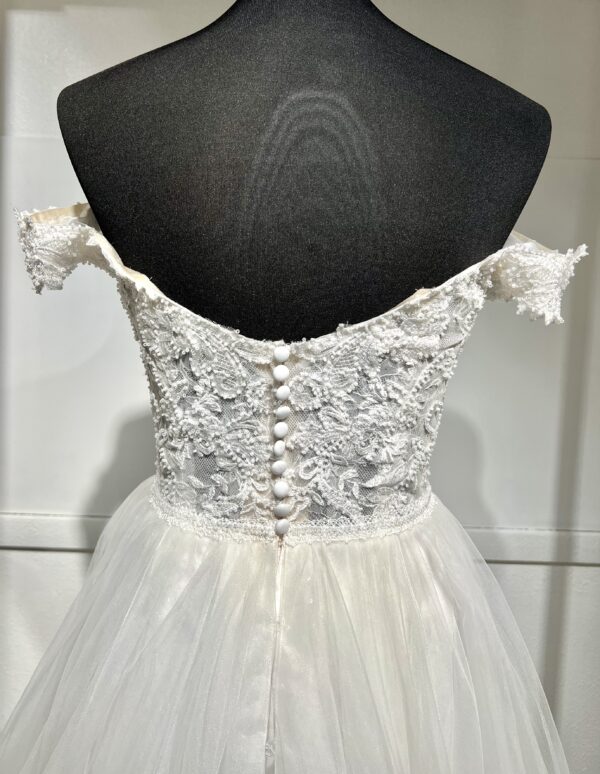 Robe de mariée trapèze Justin Alexander avec bustier cœur, bretelles tombantes, dentelle perlée et fente élégante