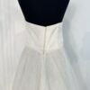 Robe de mariée princesse en dentelle brodée avec bustier structuré et jupe volumineuse fluide