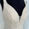 Robe sirène en dentelle florale baroque avec décolleté plongeant et jupe en tulle transparent