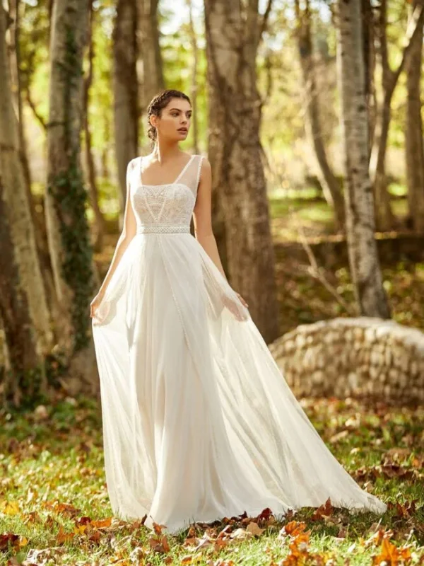 Robe de mariée trapèze en tulle Alma Novia modèle Oceania vue d'ensemble - Taille 40